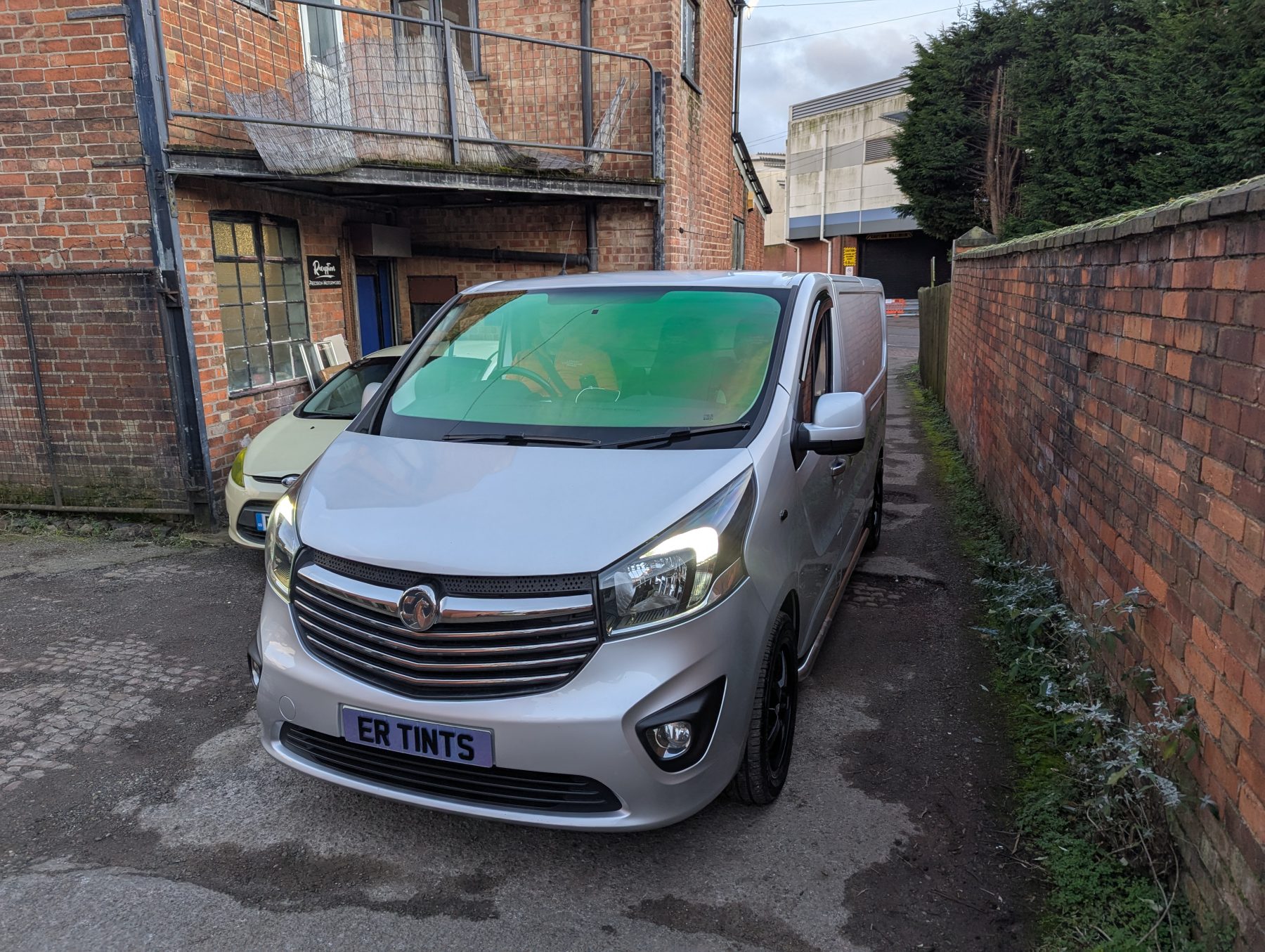 Chameleon Tinting Grey vauxhall vivaro fitted with a green chameleon windscreen