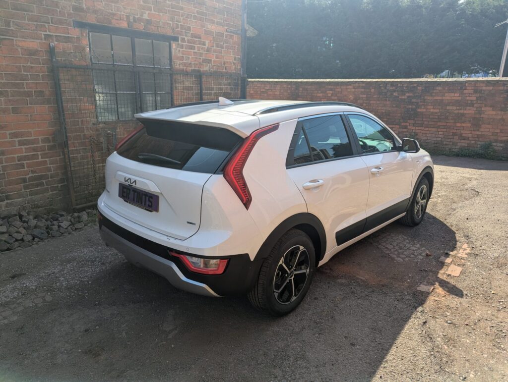 White kia niro with 5% limo tinted rear windows