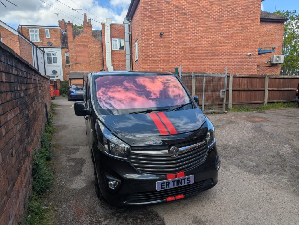 lack vauxhall vivaro fitted with a red chameleon windscreen