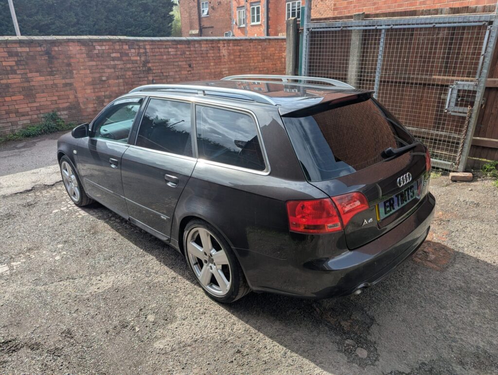 Grey audi a4 advent with 5% limo tinted rear windows
