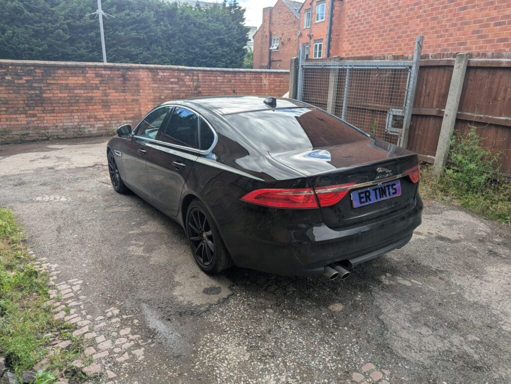 Black jaguar xj with 5% limo tinted rear windows