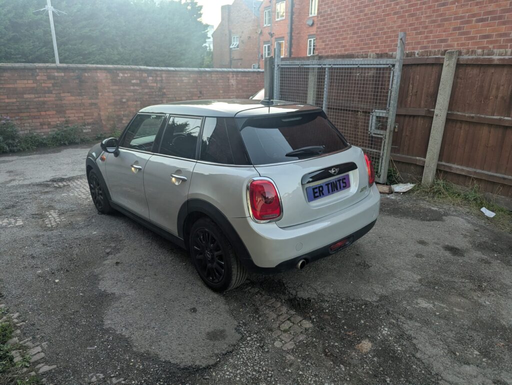 silver mini cooper with 5% limo tinted rear windows